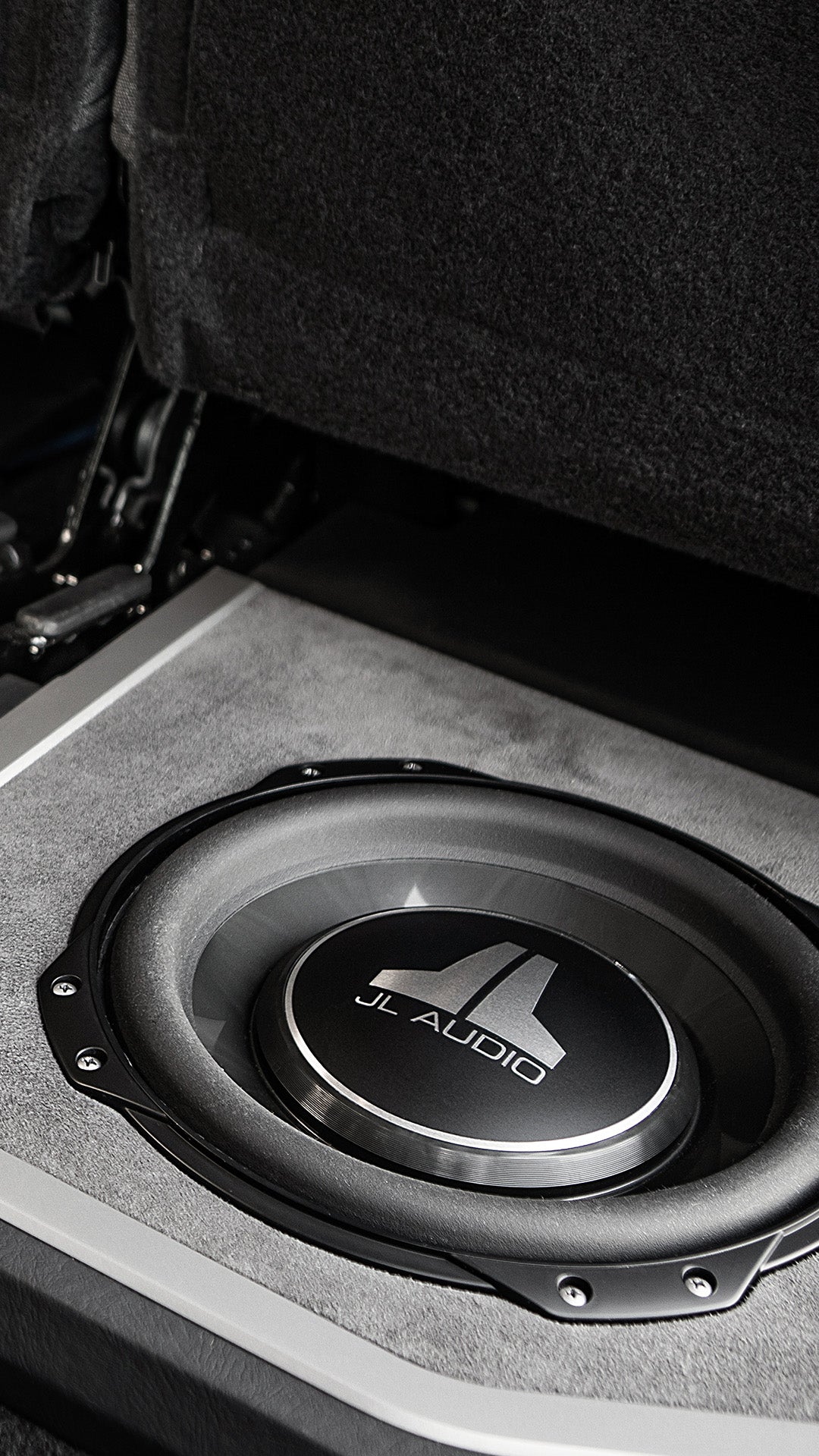 A pair of TW3 car audio subwoofers in a Ram truck.