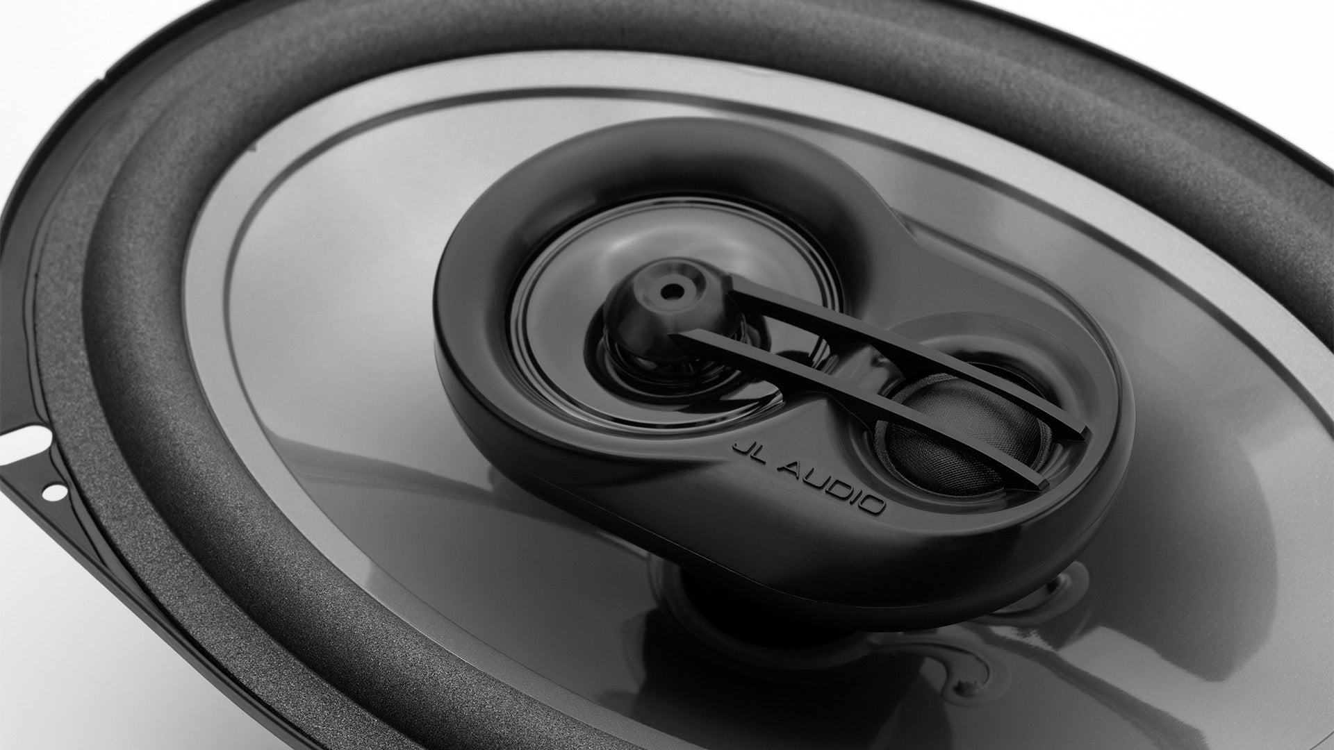 A closeup view of a C2 690TX car speaker.