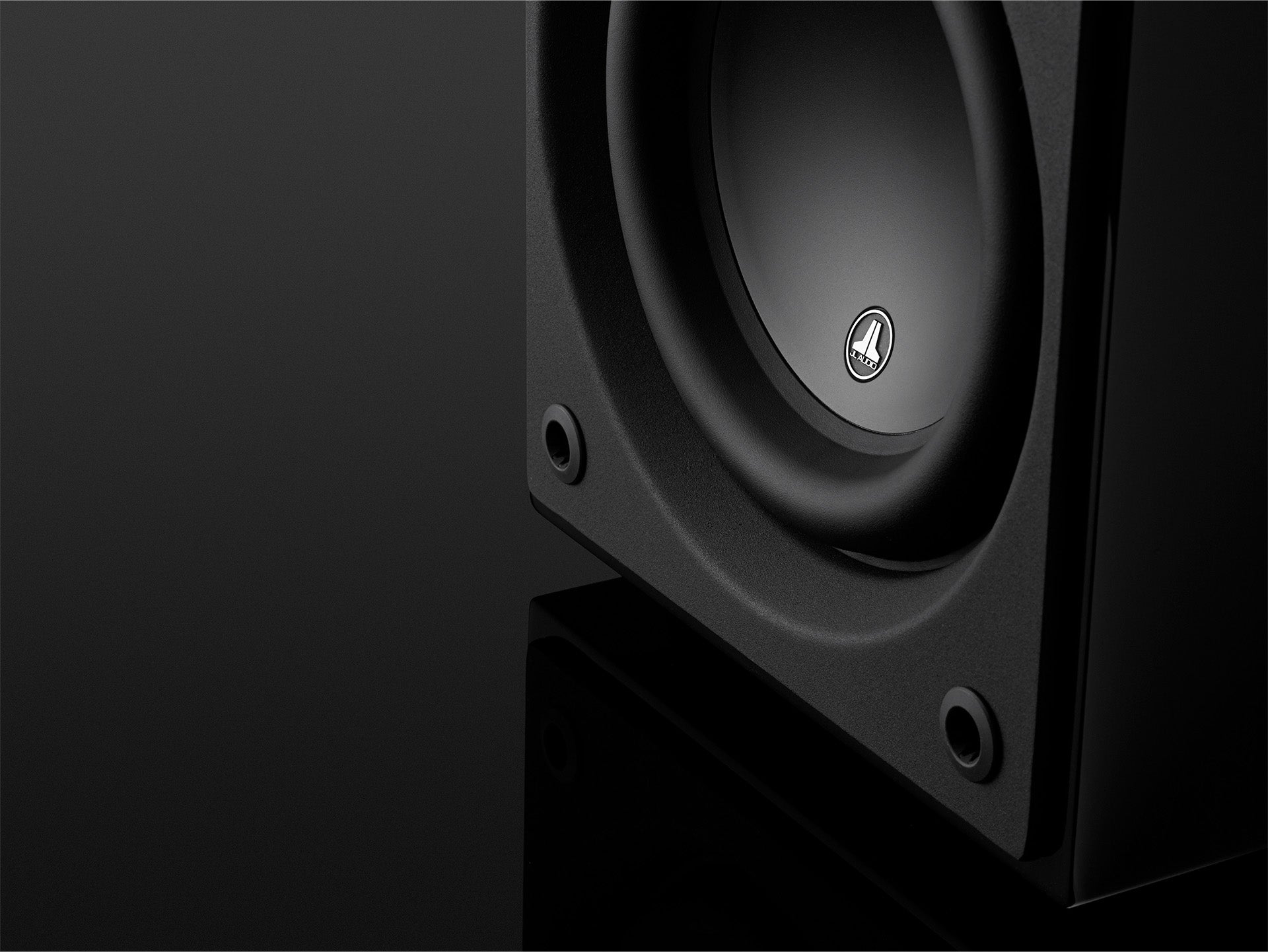 Close-up view of Dominion d110 subwoofer gloss finish.