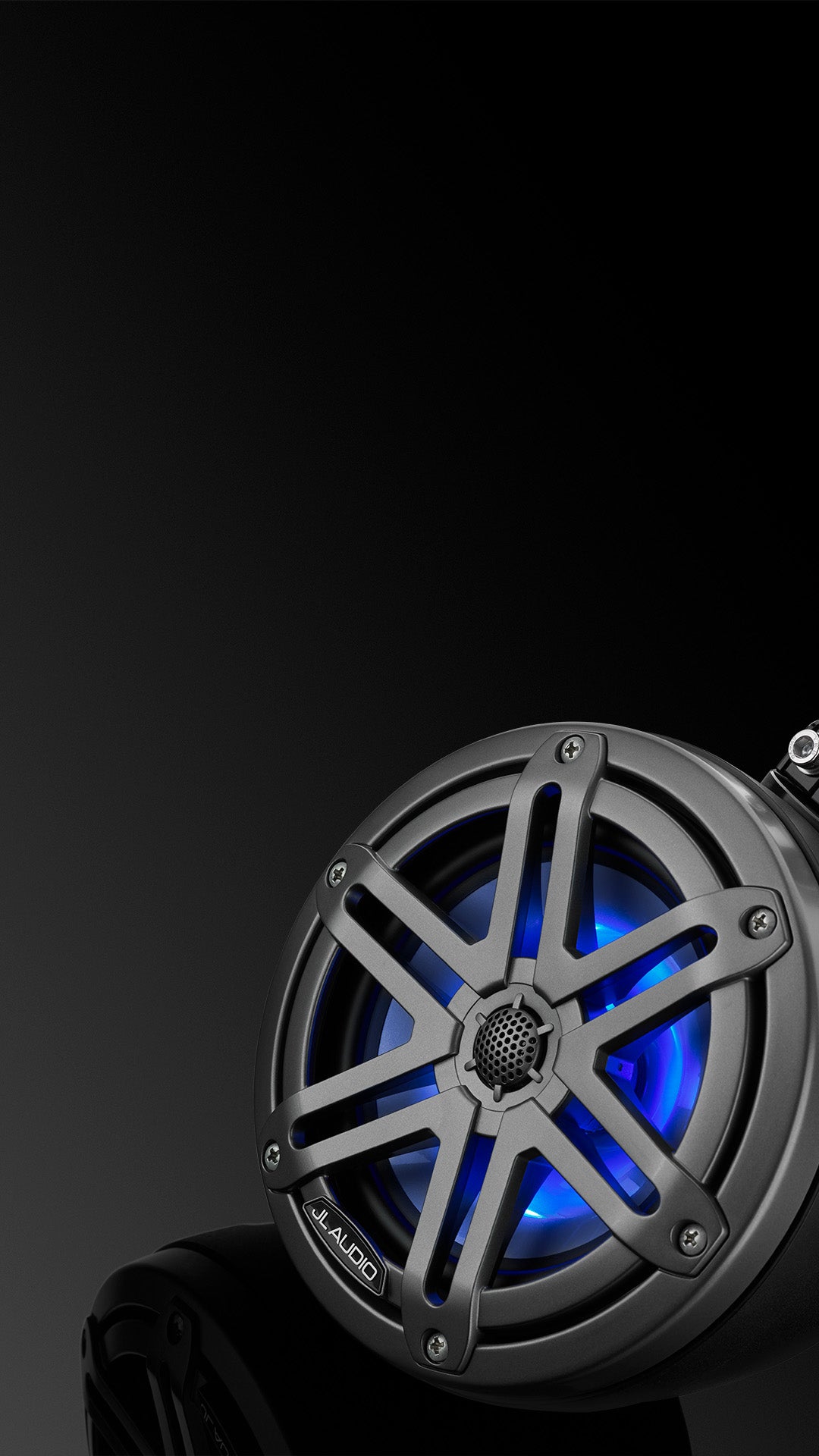 A white M3 VeX audio unit with blue colored LED in a dark sleek setting.