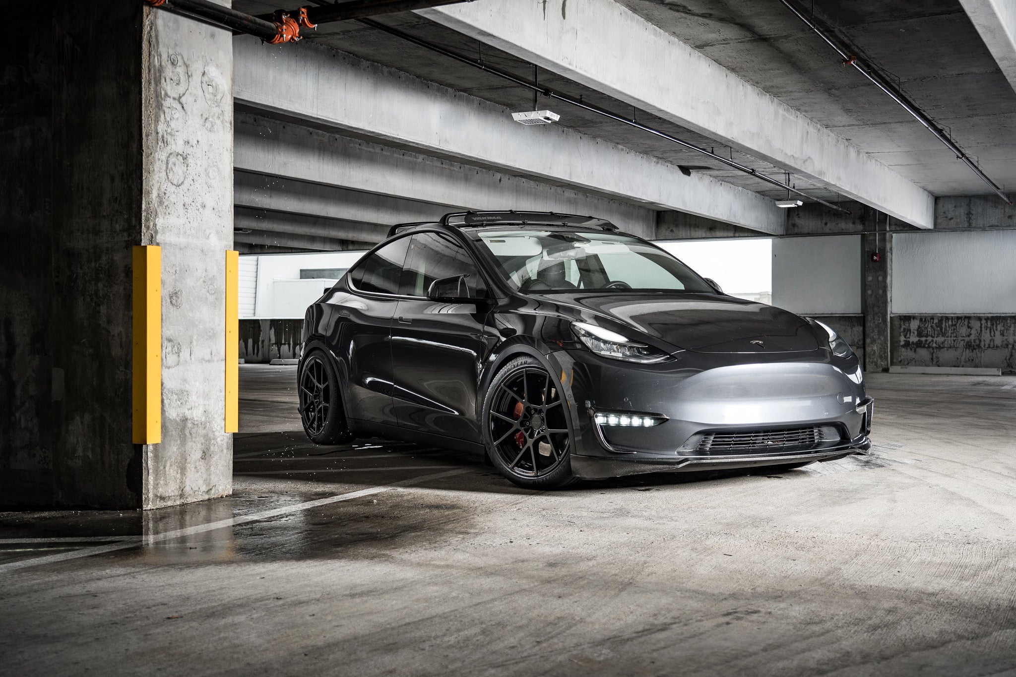 Tesla Model Y in a parking garage